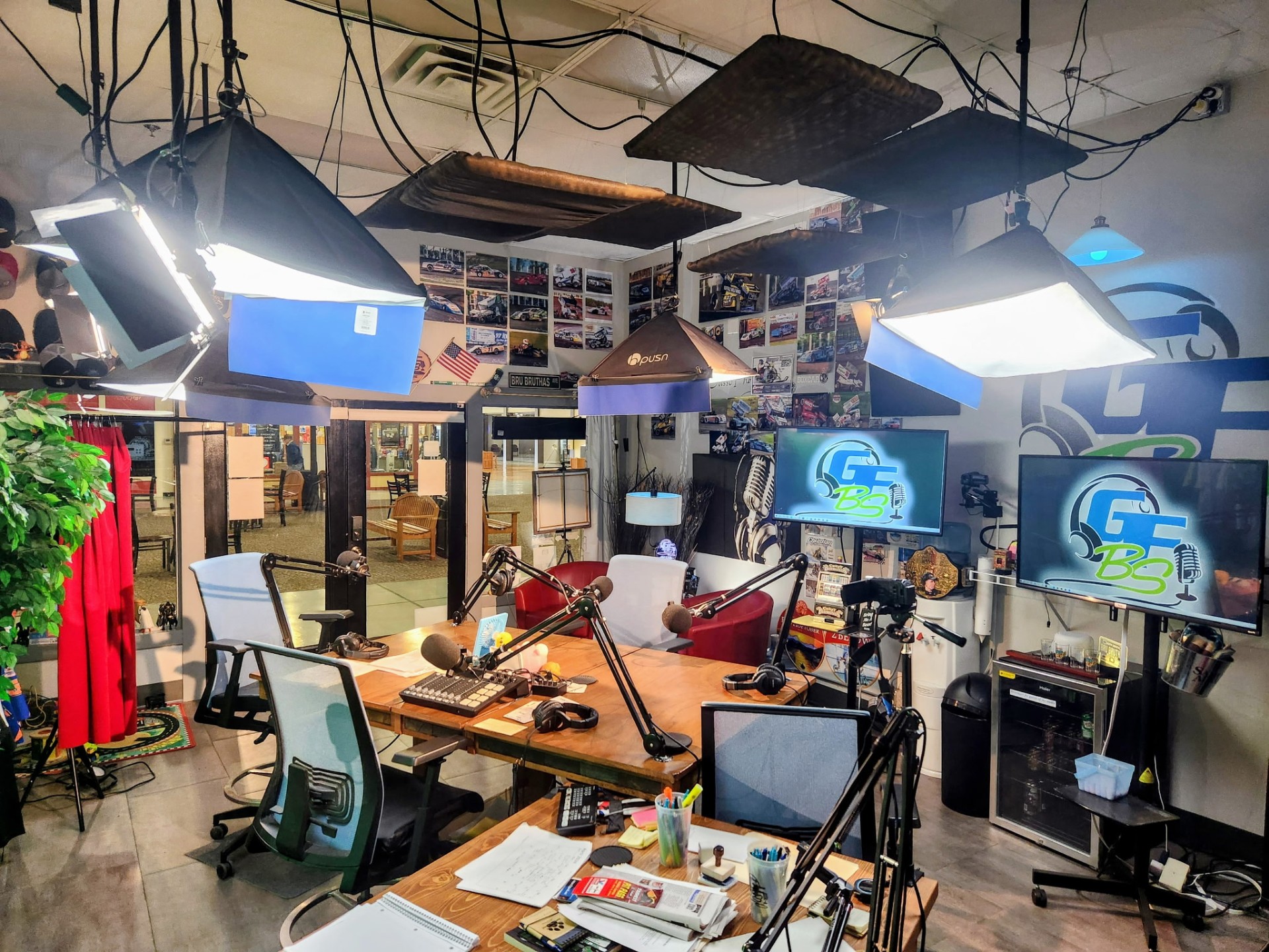 Wide view of the GFBS video podcast studio with lighting rig and monitors